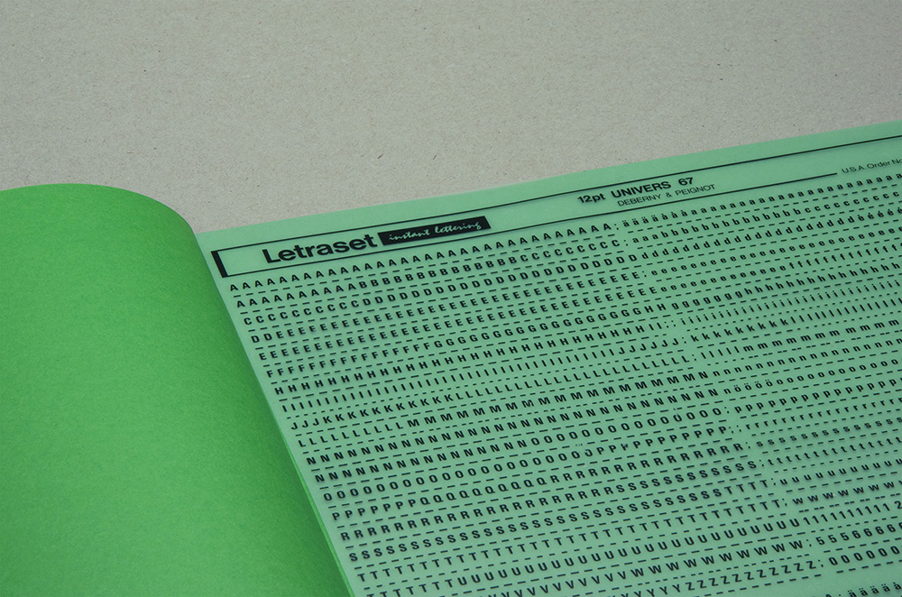 a chroma key green empty book, with letraset transfer
                      lettering sheet between its pages